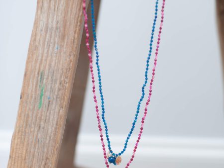 2250 Long necklace with charms and tassels in pink Online Hot Sale