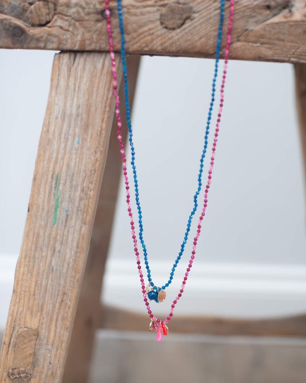 2250 Long necklace with charms and tassels in pink Online Hot Sale